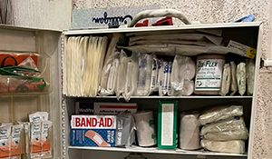 First-aid station with bandages and medical supplies.